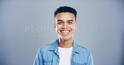 Buy stock photo Portrait, smile and student with man in studio for development, education or learning. College, scholarship and university with happy person on gray background mockup for back to school or study