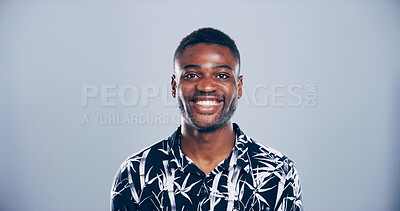 Buy stock photo Black man, smile and studio portrait with creative employee, pride and confident for freelance career on blue background. Writer, freelancer or author person with professional face by mockup space.
