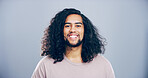 Portrait, space and student with happy man in studio for development, education or learning. College, scholarship and university with smile of person on gray background for back to school or study