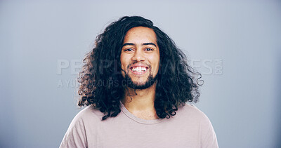 Buy stock photo Portrait, space and student with happy man in studio for development, education or learning. College, scholarship and university with smile of person on gray background for back to school or study