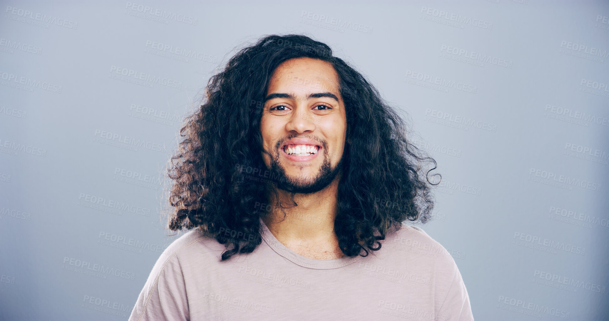 Buy stock photo Portrait, space and student with happy man in studio for development, education or learning. College, scholarship and university with smile of person on gray background for back to school or study
