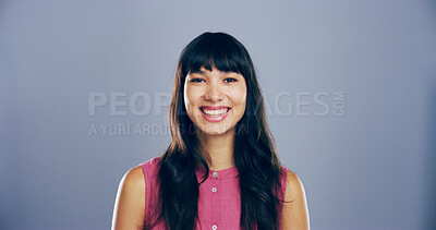 Buy stock photo Portrait, smile and space with student woman in studio for development, education or learning. College, scholarship and university with happy person on gray background mockup for knowledge or study
