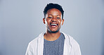 Portrait, laugh and creative black man in studio, comedy screenwriter and script author isolated on gray background. Face, funny and happy business person, professional and confidence with space