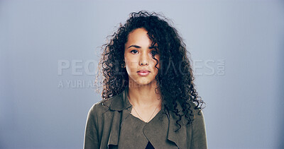 Buy stock photo Serious, professional and portrait of woman in studio for freelance career, editor and journalism. Mockup space, business and isolated person for news agency, publisher and job on gray background