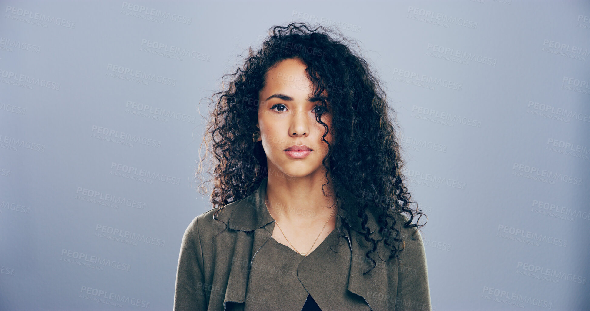 Buy stock photo Serious, professional and portrait of woman in studio for freelance career, editor and journalism. Mockup space, business and isolated person for news agency, publisher and job on gray background
