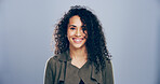 Portrait, smile and creative woman in studio, wig designer and hair styling expert isolated on gray background. Face, happy and business person, professional or confidence with mockup space in Spain
