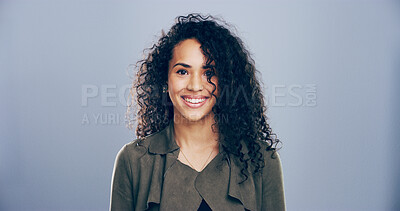 Buy stock photo Portrait, smile and creative woman in studio, wig designer and hair styling expert isolated on gray background. Face, happy and business person, professional or confidence with mockup space in Spain
