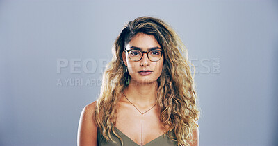 Buy stock photo Glasses, portrait and student with woman in studio for development, education or learning. College, space and university with intelligent person on gray background for back to school study or vision