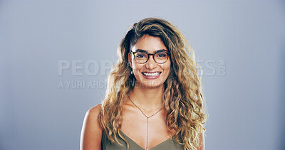 Buy stock photo Glasses, portrait and student with happy woman in studio for development, education or learning. College, smile and university with intelligent person on gray background mockup for knowledge or study