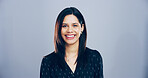 Portrait, writer and creative business woman in studio, journalist and reporter isolated on gray background. Face, smile and confident person, professional and worker with mockup space in Spain