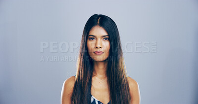 Buy stock photo Portrait, serious and student with woman in studio for development, education or learning. College, scholarship and university with confident learner on gray background space for knowledge or study