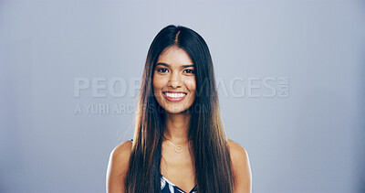 Buy stock photo Portrait, smile and space with woman in studio for development, education or learning. Academy, college and university with confident student on gray background mockup for knowledge or study