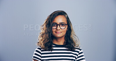 Buy stock photo Glasses, portrait and student with woman in studio for development, education or learning. College, intelligent and university with smart person on gray background mockup for knowledge or study