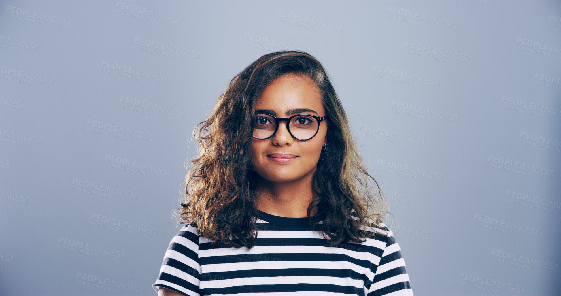 Buy stock photo Glasses, portrait and student with woman in studio for development, education or learning. College, intelligent and university with smart person on gray background mockup for knowledge or study