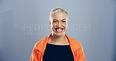 Buy stock photo Happy woman, smile and studio portrait with creative employee, pride and confident for freelance career. Writer, freelancer or author with positive attitude by mockup space on blue background