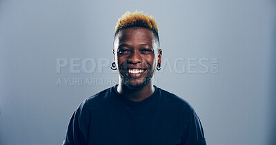 Buy stock photo Edgy, happy student or portrait of black man in studio for skill development, college education or learning. Smile, confident or cool person on grey background mockup space for school scholarship