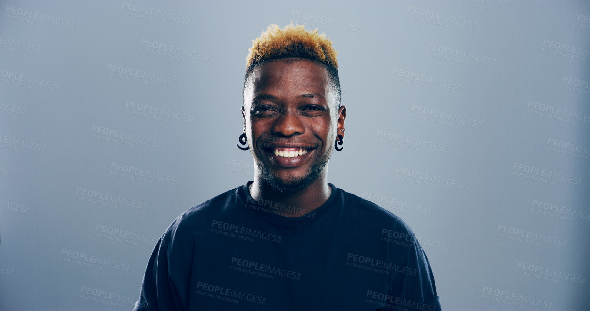 Buy stock photo Edgy, happy student or portrait of black man in studio for skill development, college education or learning. Smile, confident or cool person on grey background mockup space for school scholarship