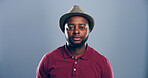 African man, portrait and creative professional in studio, serious for career with pride and confidence. Business, about us and opportunity or growth as copywriter on blue background by space