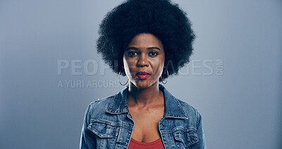 Buy stock photo Black woman, portrait and afro for hair or fashion, designer jean jacket for style or model on blue studio background. Natural texture, volume and female person with face for trendy denim clothes
