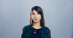 Portrait, space and student with model in studio for development, education or learning. College, scholarship and university with confident woman on gray background mockup for academic curriculum