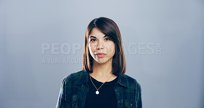 Buy stock photo Portrait, space and student or model in studio for development, education or learning. College, scholarship and university with confident woman on gray background mockup for academic curriculum