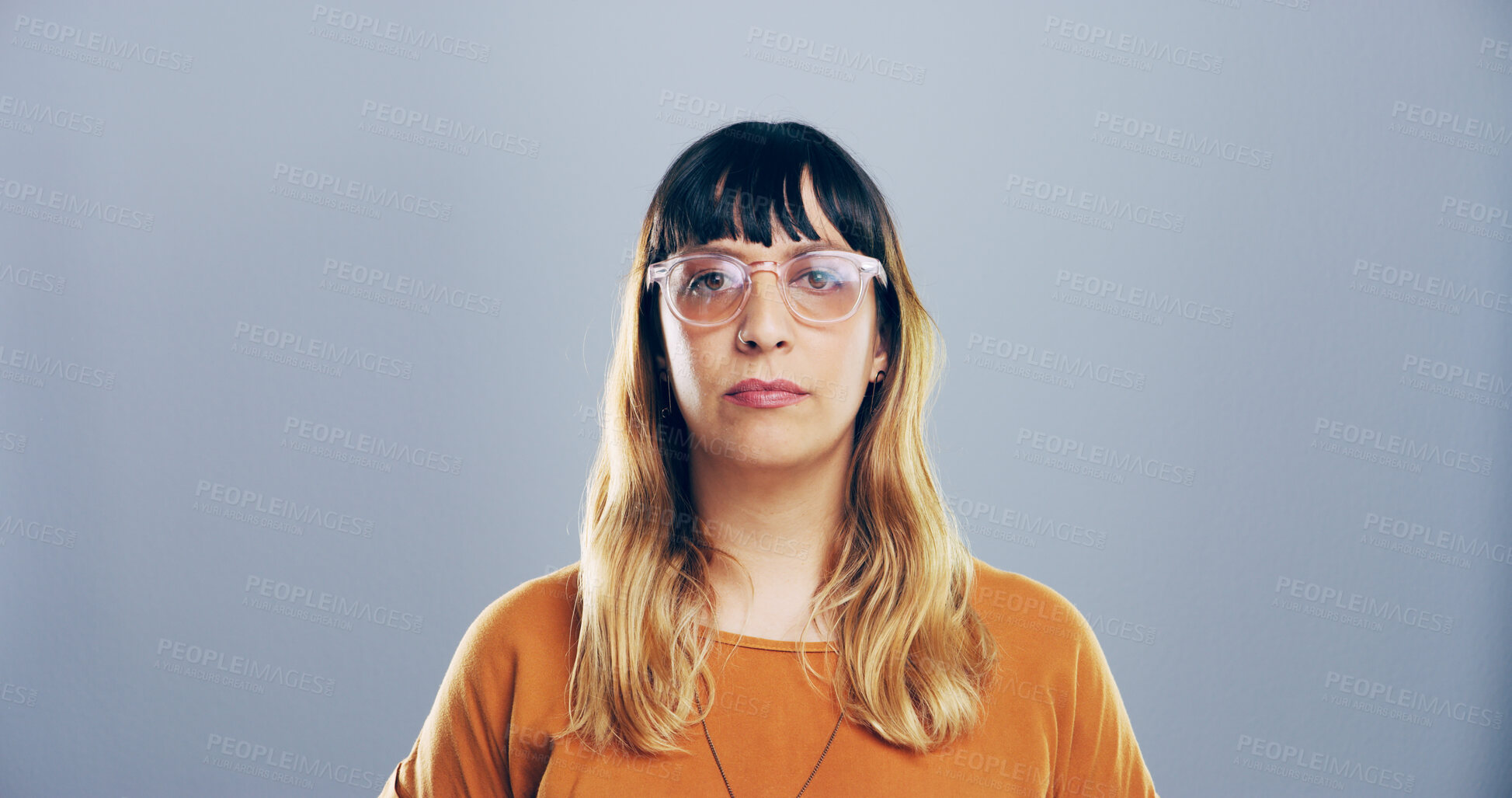 Buy stock photo Professional, editor and portrait of woman on gray background for freelance career, editing and journalism. Mockup space, glasses and isolated person for news agency, publisher and job in studio