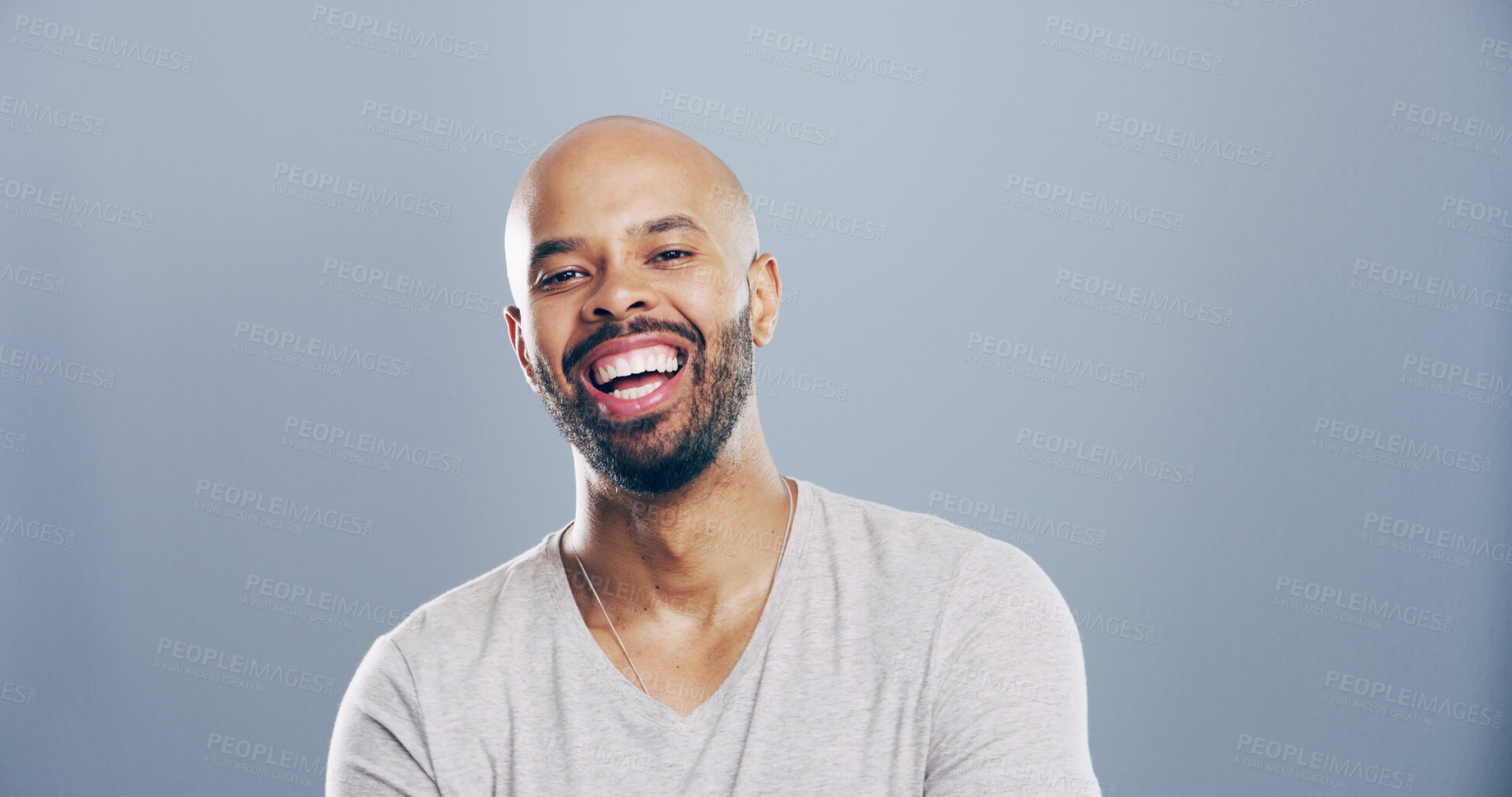 Buy stock photo Portrait, laugh and business man in studio, comedy screenwriter and script author. Face, funny and happy African person, creative professional and excited with space isolated on gray background