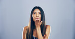 Girl, portrait and blowing kiss in studio for thank you, kindness and appreciation. Mockup space, person and affection gesture on blue background for goodbye and expression response for attraction