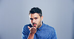 Portrait, man or blowing with kiss for romance, affection or love on a gray studio background. Creative, male person or model with romantic gesture or palm for care, distance or flirt on mockup space