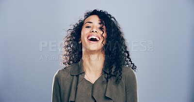 Buy stock photo Woman, portrait and laughing for success in studio, joy for opportunity in creative career or promotion. Happy, space and female person excited with comic illustrator or designer on blue background