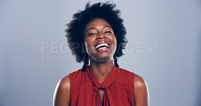 Buy stock photo Black woman, happy and laughing in portrait in a studio for funny humor with natural hair on blue background. Excited, comedy or positive emotion for afro hairstyle with pride or confidence by space