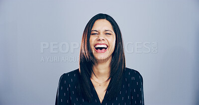 Buy stock photo Crazy, woman and happy for laugh in studio with confidence, joke and good mood on gray background. Space, young model and smile with carefree personality for comedy, humor or funny reaction to meme