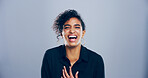 Face, woman and happy for laugh in studio with confidence, joke and good mood on gray background. Space, young model and smile with carefree personality for comedy, humor or funny reaction to meme