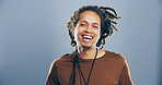 Portrait, man and laughing in studio for humor, lol and smile for comedy isolated on gray background with space. Face, funny and happy African person with joke, goofy and excited with comic emotion