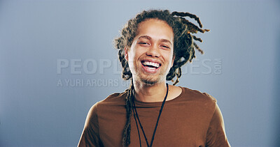 Buy stock photo Portrait, man and laughing in studio for humor, lol and smile for comedy isolated on gray background with space. Face, funny and happy African person with joke, goofy and excited with comic emotion