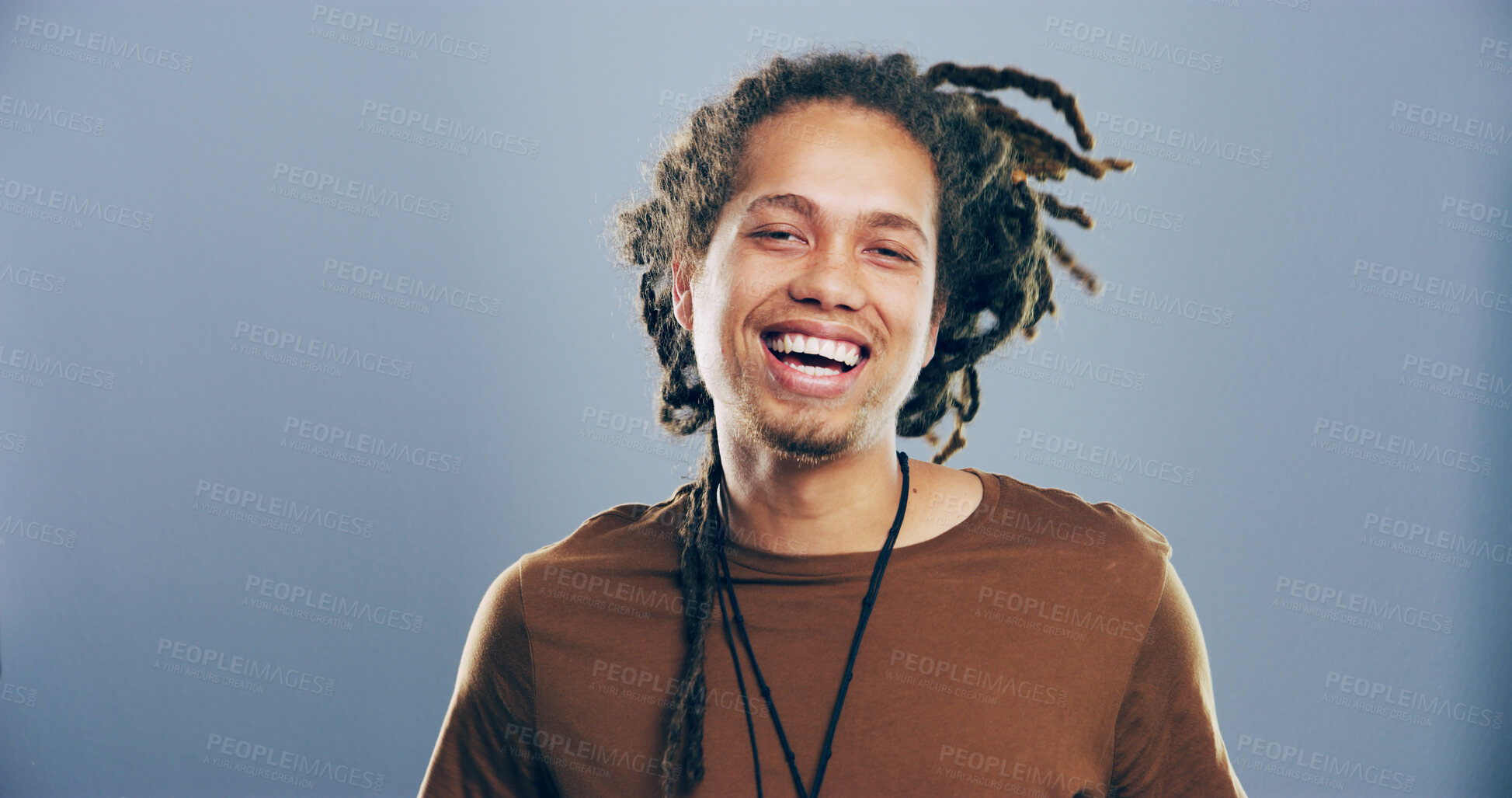 Buy stock photo Portrait, man and laughing in studio for humor, lol and smile for comedy isolated on gray background with space. Face, funny and happy African person with joke, goofy and excited with comic emotion