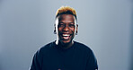 Portrait, Black man and smile for laugh in studio with confidence, joke and good mood on gray background. Space, model and happy with carefree personality for comedy, humor or funny reaction to meme
