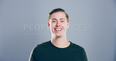 Buy stock photo Happy, student and portrait of man in studio with smile for scholarship, registration and college application. Mockup space, gray background and person excited for education, university and school