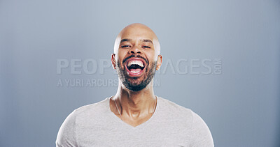 Buy stock photo Comedy, man and portrait for laugh in studio with confidence, joke or good mood on gray background. Space, excited model and smile with carefree personality for comic, humor or funny reaction to meme