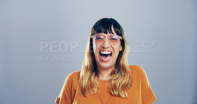 Buy stock photo Crazy, woman and portrait for laugh in studio with confidence, joke or good mood on gray background. Space, excited model or smile with carefree personality for comic, humor or funny reaction to meme