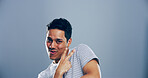 Portrait, space and man with peace sign in studio with positive attitude, confidence or facial expression. Grey background, casual mockup and male model for cool gesture, satisfaction or v symbol