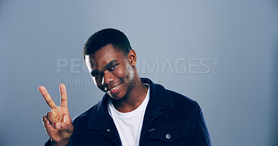 Buy stock photo Portrait, space and black man with peace sign in studio with positive attitude, confidence and expression mockup. Grey background, face and African male model for cool gesture, fashion and symbol