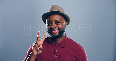 Buy stock photo Portrait, space and black man with peace sign in studio with positive attitude, confidence and expression mockup. Grey background, face or proud African male model for cool gesture, vote or v symbol