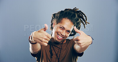 Buy stock photo Portrait, thumbs up and man in studio, like and confidence on gray background. Face, happy person and model with hand gesture, agreement or icon with symbol, perfect and review with emoji or feedback