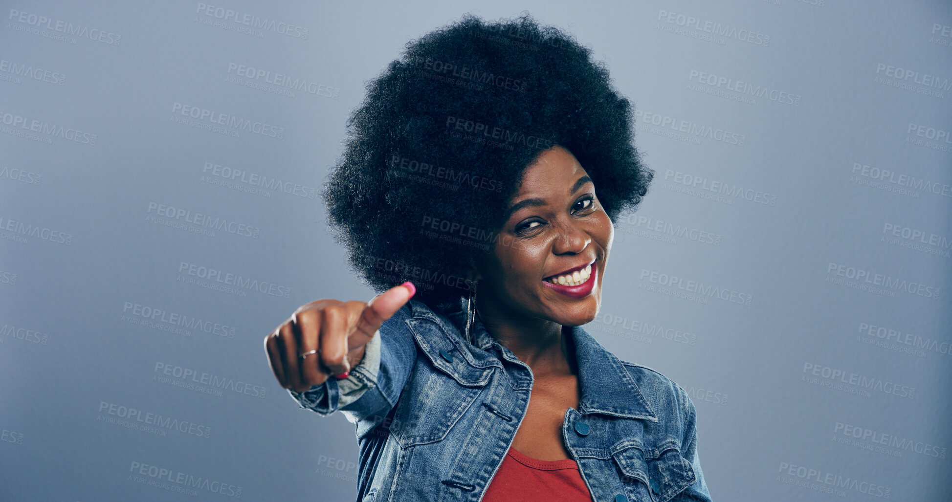 Buy stock photo Portrait, thumbs up and black woman in studio, icon and agreement on gray background. Face, African person and model with hand gesture, feedback and thank you with symbol, perfect and like with emoji