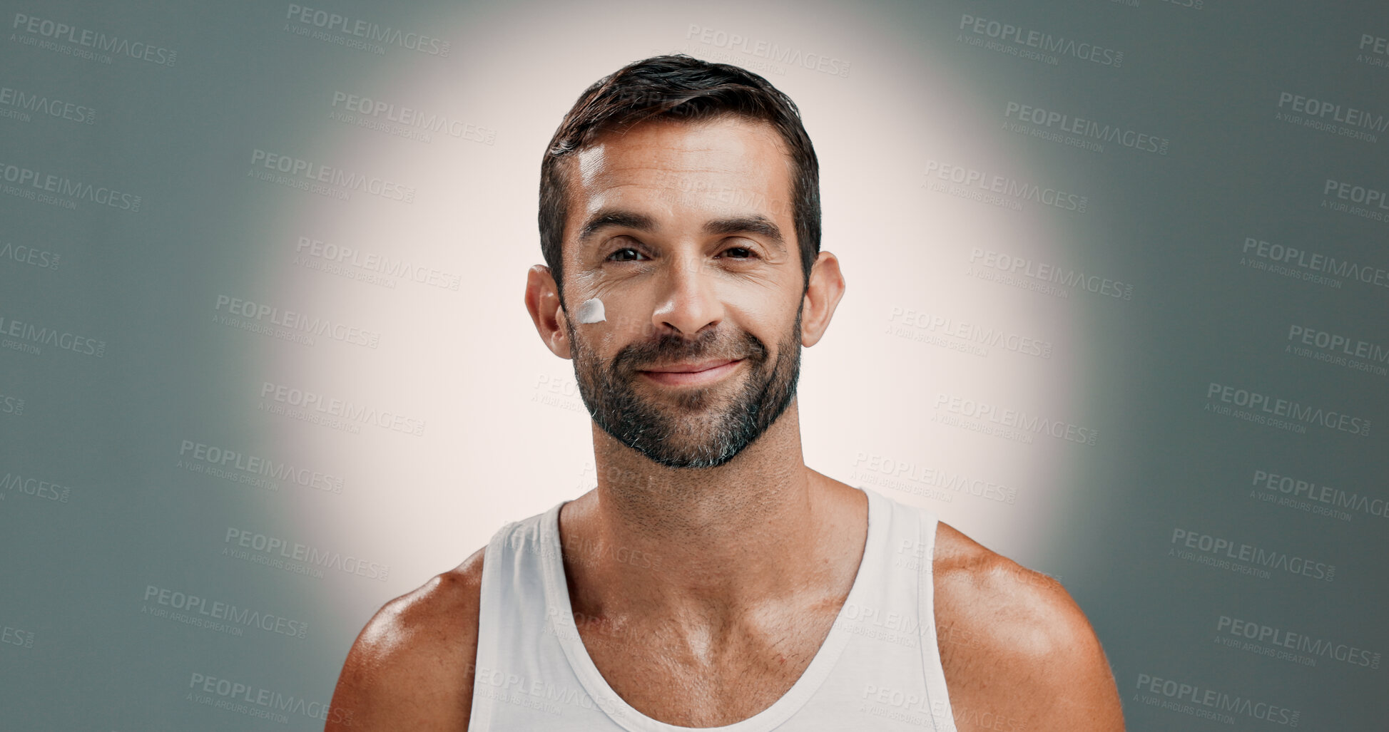 Buy stock photo Skincare, face cream and portrait of man in studio for wellness, health and hydration for facial treatment. Dermatology, beauty and person with lotion, moisturizer or cosmetics on gradient background