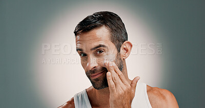 Buy stock photo Face cream, dermatology and portrait of man in studio for wellness, health and hydration for facial treatment. Skincare, beauty and person with lotion, moisturizer or cosmetics on gradient background