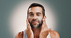 Washing, soap and portrait of happy man in studio for wellness, cleaning and facial treatment. Dermatology, beauty and person with cream, moisturizer and skincare cosmetics on gradient background