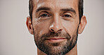 Portrait, skincare and man with natural beauty, beard and facial treatment isolated on white background. Face, cosmetics and male model with confidence for dermatology, glow and aesthetic in studio