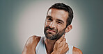 Neck pain, frustrated and portrait of man in studio with injury, tension and inflammation on gradient background. Stress, health and person with massage for muscle strain, medical risk and pressure